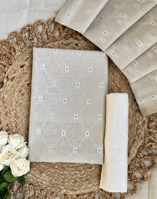 Off White Linen Tissue Unstitched Suit with Ikat-Inspired Embroidery