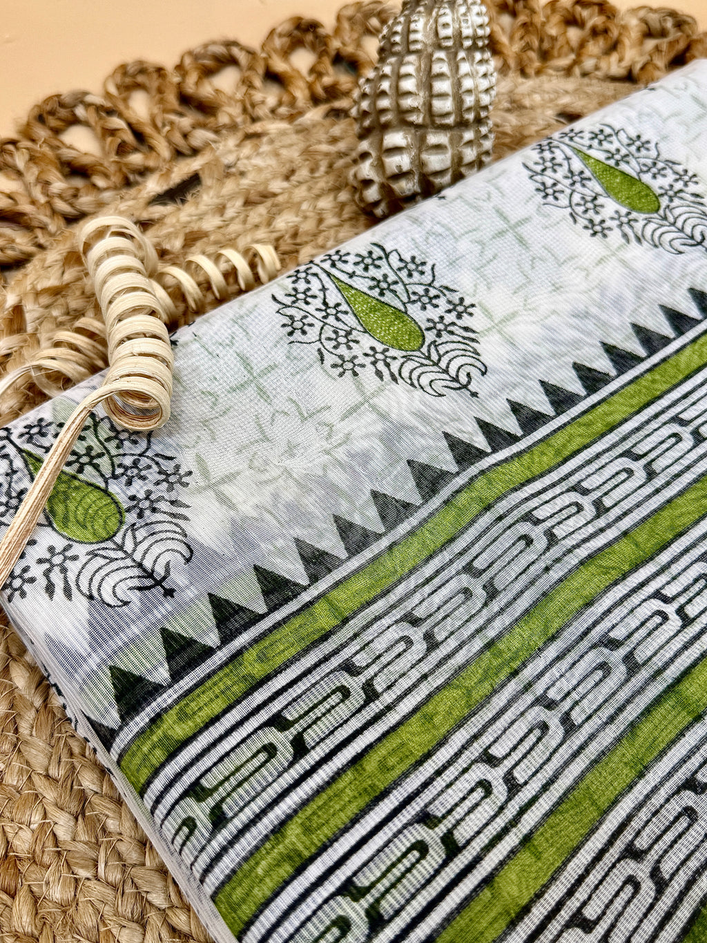 Off White Supernet Cotton Saree with Green Leaf Embroidery & Tribal Border