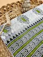 Off White Supernet Cotton Saree with Green Leaf Embroidery & Tribal Border