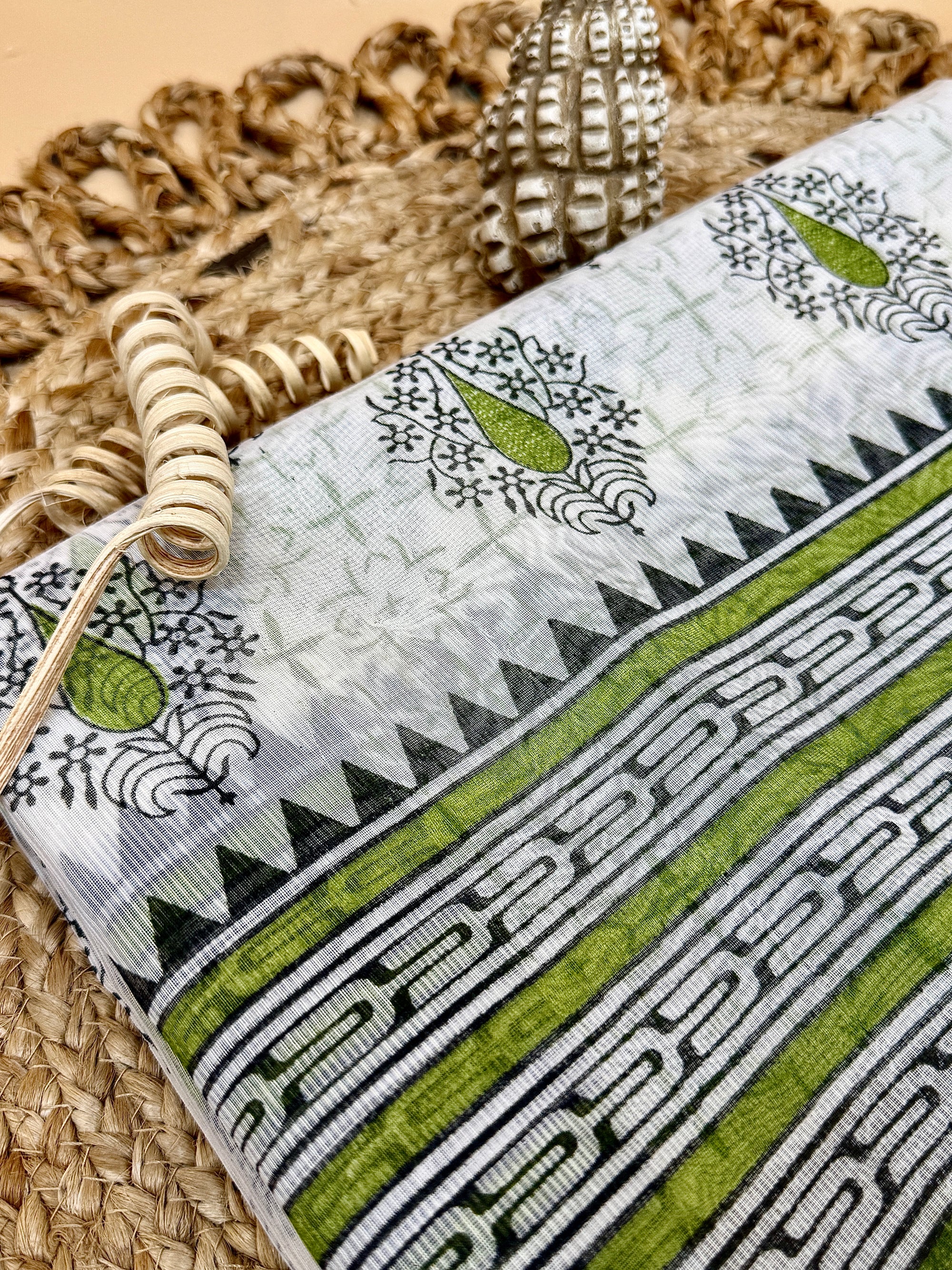 Off White Supernet Cotton Saree with Green Leaf Embroidery & Tribal Border