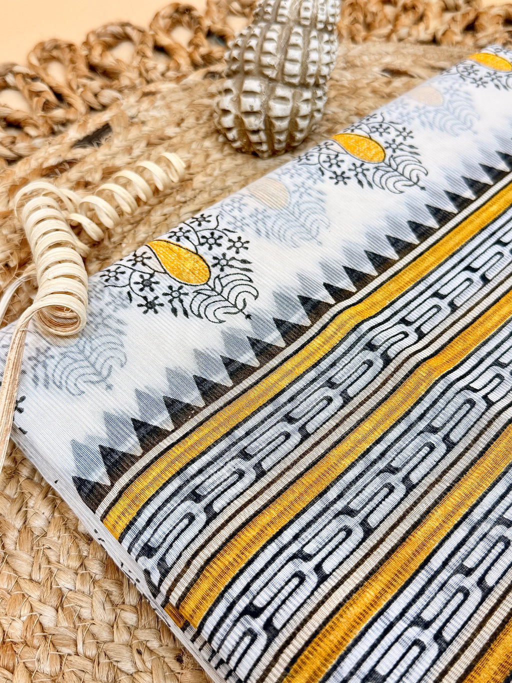 Off White Supernet Cotton Saree with Mustard Leaf Embroidery & Contrast Border