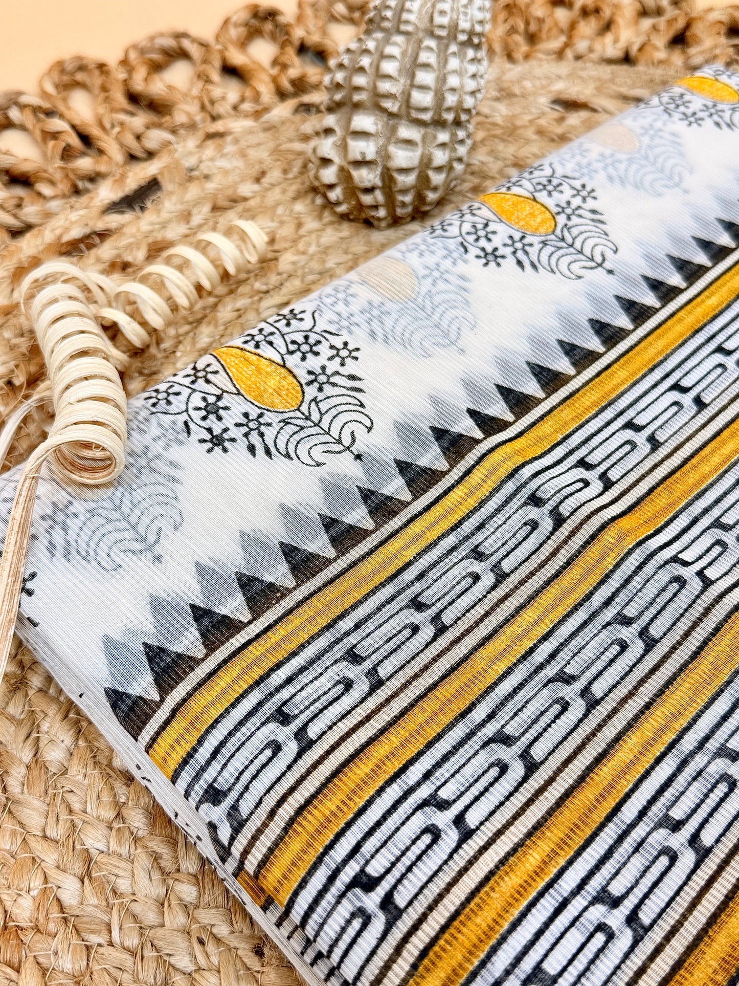 Off White Supernet Cotton Saree with Mustard Leaf Embroidery & Contrast Border