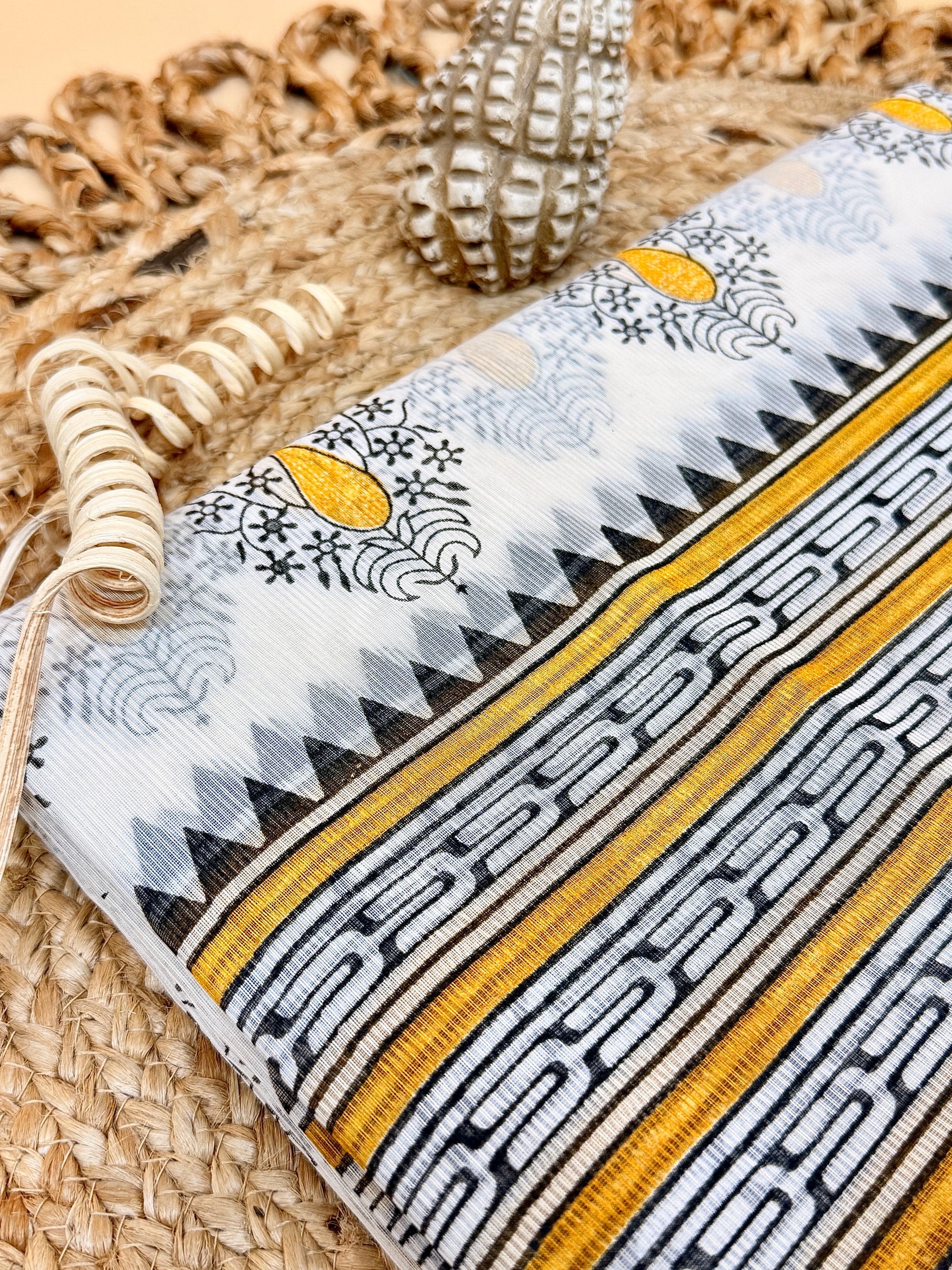 Off White Supernet Cotton Saree with Mustard Leaf Embroidery & Contrast Border