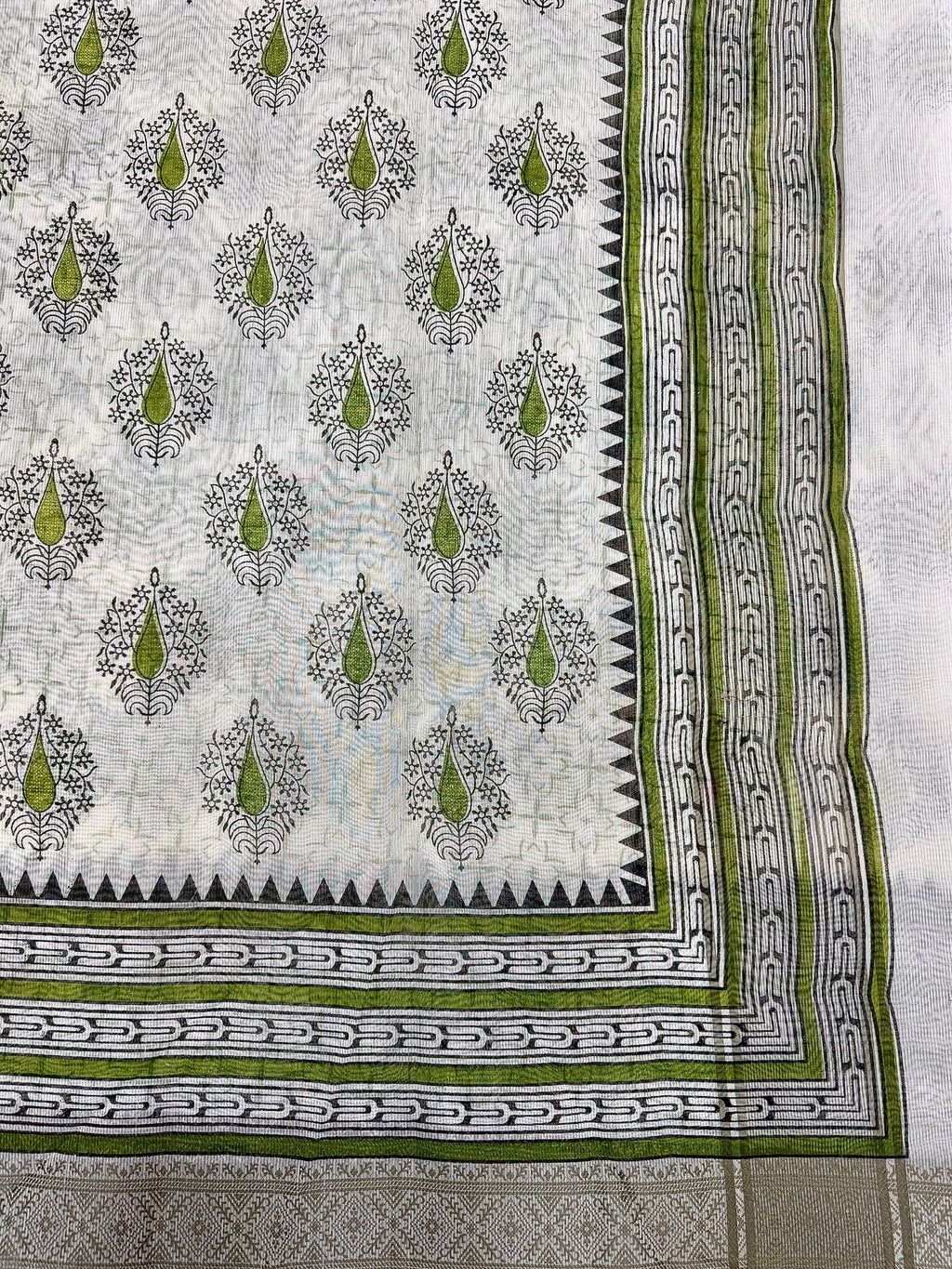 Off White Supernet Cotton Saree with Green Leaf Embroidery & Tribal Border
