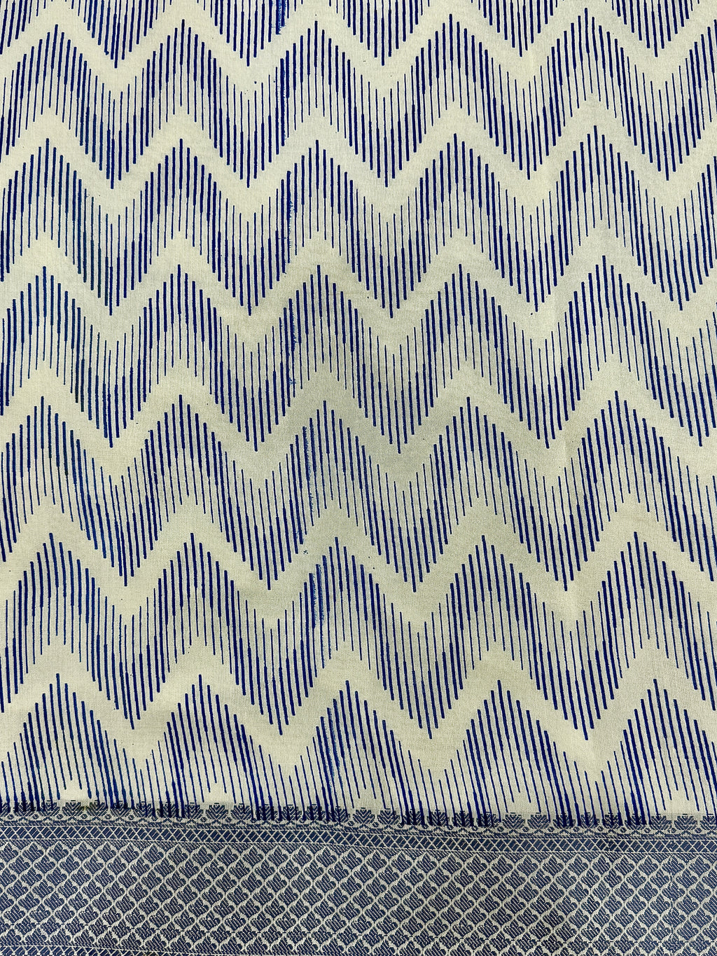 Off White Supernet Cotton Saree with Indigo Floral Design & Contrast Border