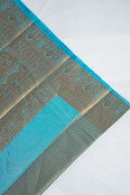 Decorative fabric with blue and gold patterns on a white background
