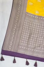 Yellow Viscose Georgette Saree with Purple Contrast Border