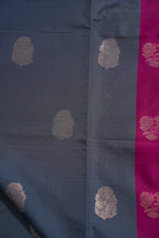 Blue fabric with gold floral patterns and a pink border