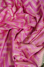 Pink fabric with gold patterns