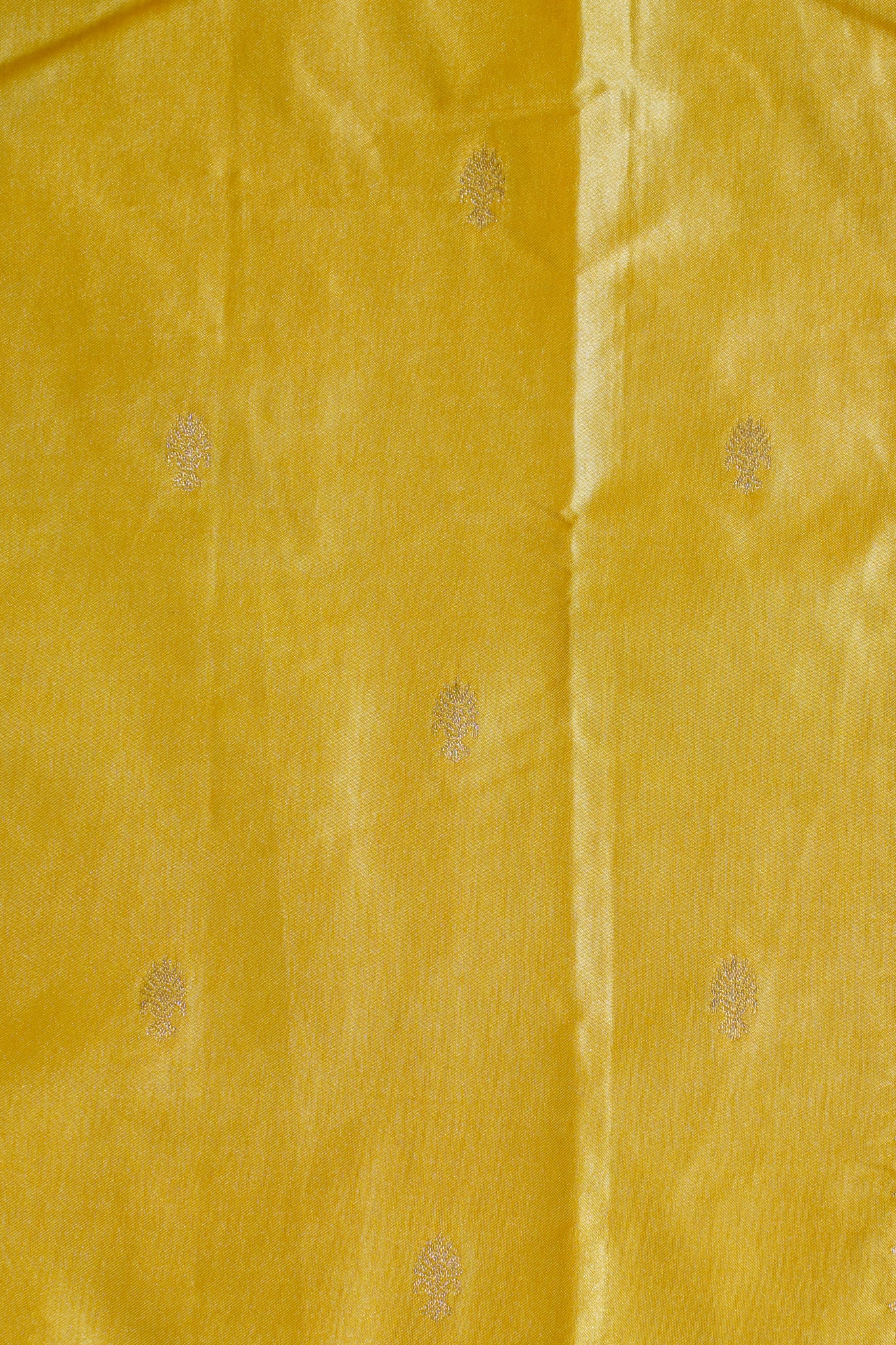 Close-up of yellow fabric with subtle pattern