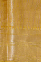 Close-up of a yellow fabric with a subtle pattern