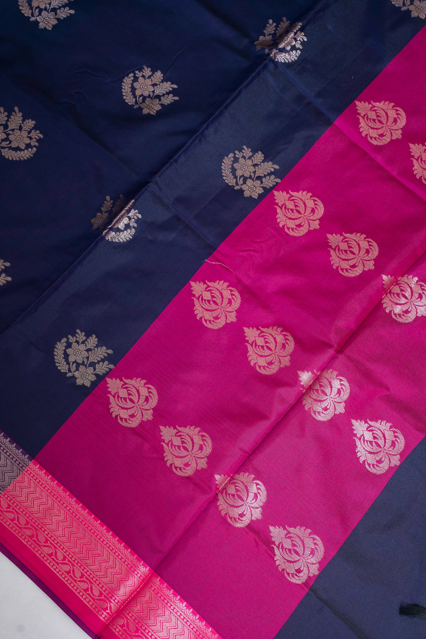 Navy blue and pink saree with gold patterns