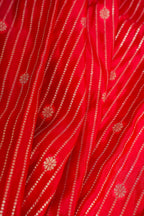 Red fabric with white floral patterns