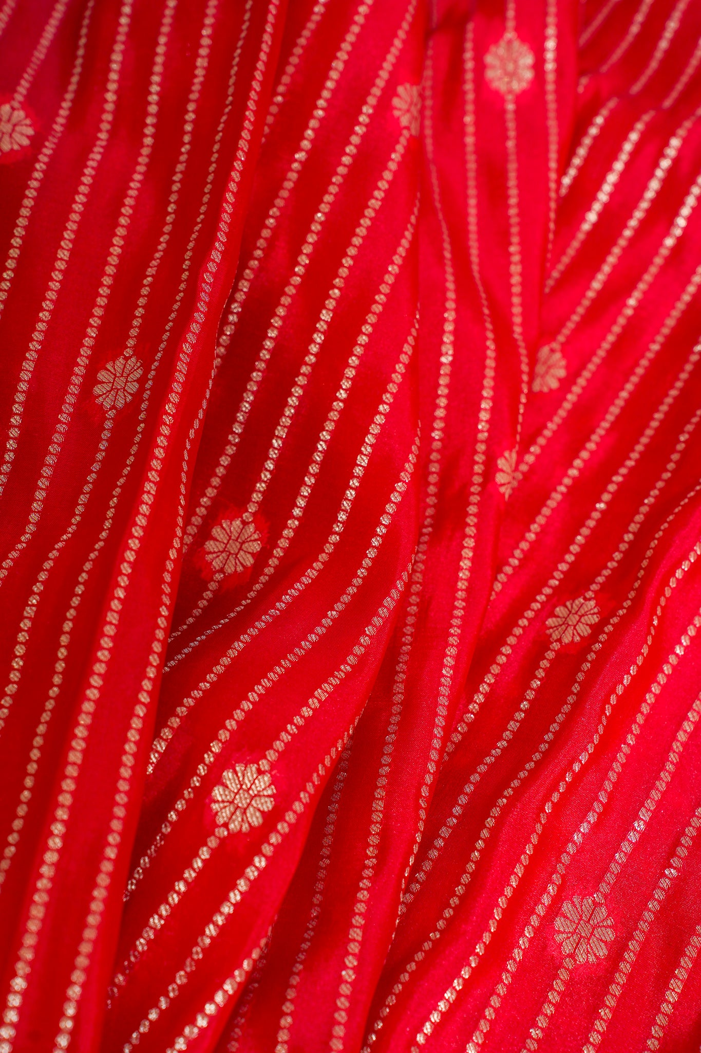 Red fabric with white floral patterns