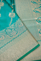 Teal Green Mashroo Silk Saree with Zari Buti and Ornate Border