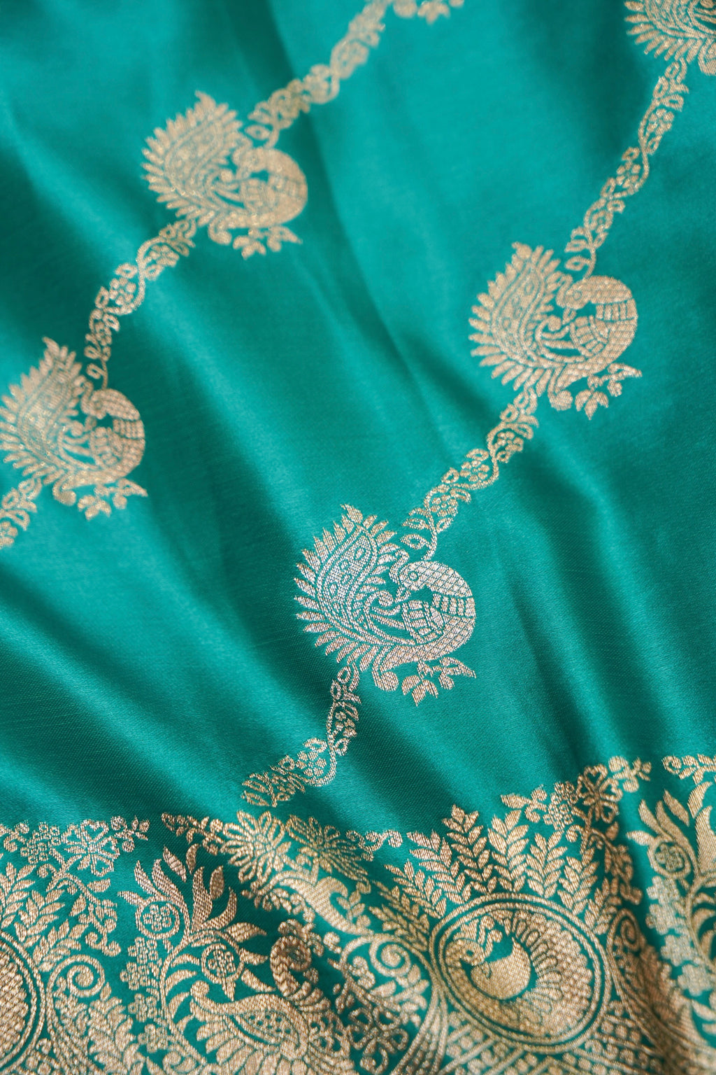 Teal Green Mashroo Silk Saree with Zari Buti and Ornate Border