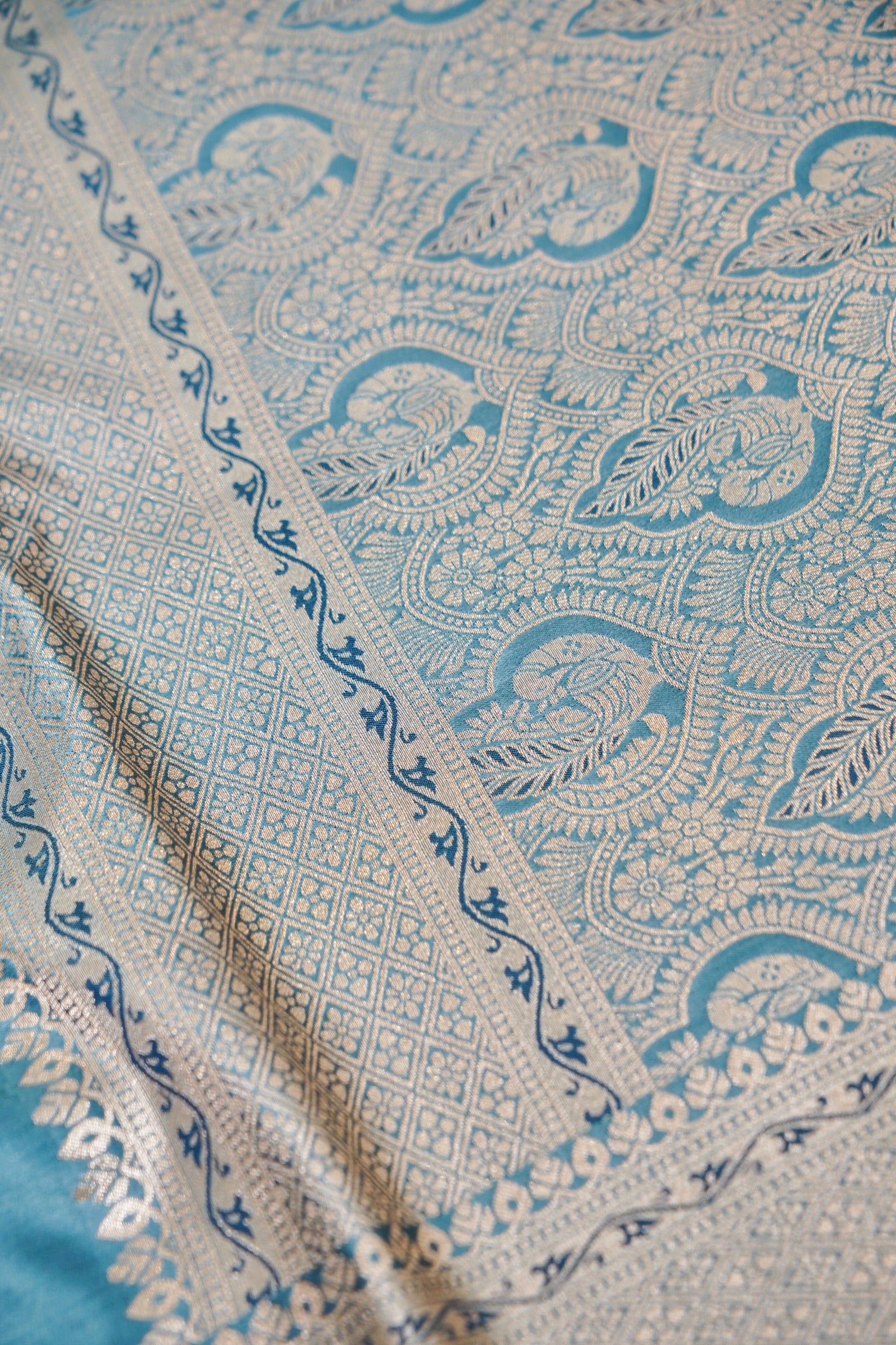 Teal Blue Mashroo Silk Saree with Zari Buti and Ornate Border
