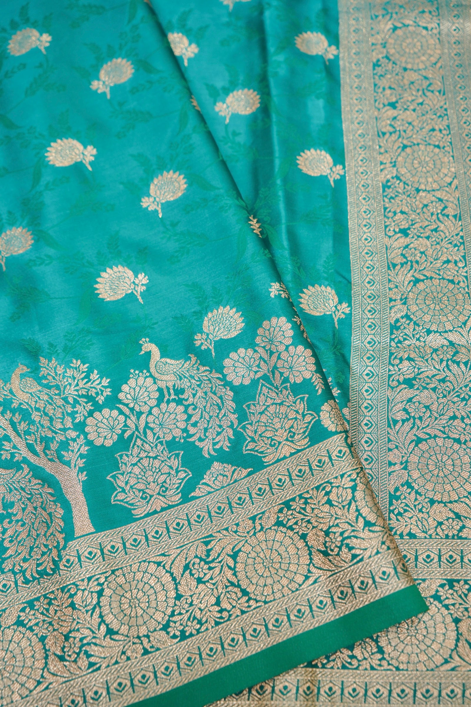 Emerald Green Mashroo Silk Saree with Zari Buti and Ornate Border